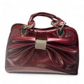 Burgundy patent leather bow handbag