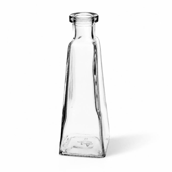 A 6 oz. pyramid glass bottle made of clear glass on a white background