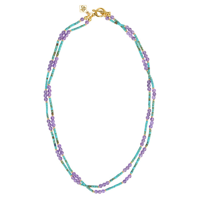 Beaded necklace with a gold clasp on a white background