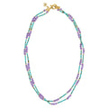 Beaded necklace with a gold clasp on a white background