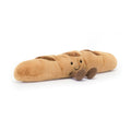 Baguette plush stuffed animal with a smiley face and little legs on a white background