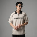Polo oversize bicolore imprimé pour un style streetwear décontracté. Mode K-fashion. - Taille M