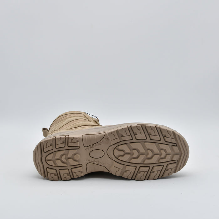 A single tan tactical boot shown from a rear three-quarter view, highlighting its textured rubber outsole tread against a light gray studio background.