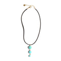 Necklace with turquoise beads on a white background