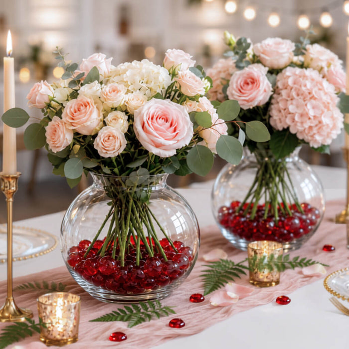 Glass bowl vases with pink flowers and ruby red vase gems