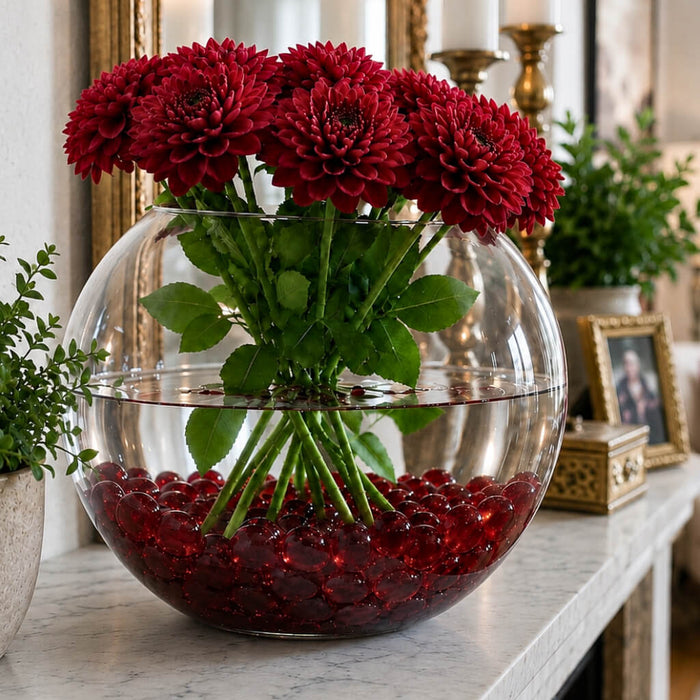 Glass bowl vase with red flowers and ruby red vase gems